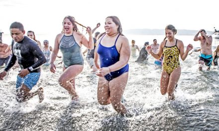 VIDEO/PHOTOS: Dozens brave Polar Bear Plunge to bring in the New Year